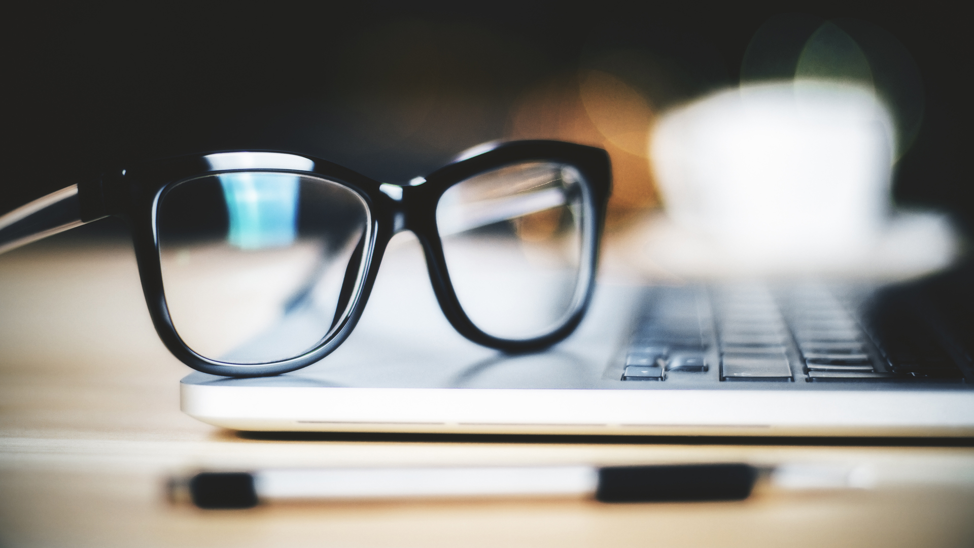 Eye glasses on a laptop