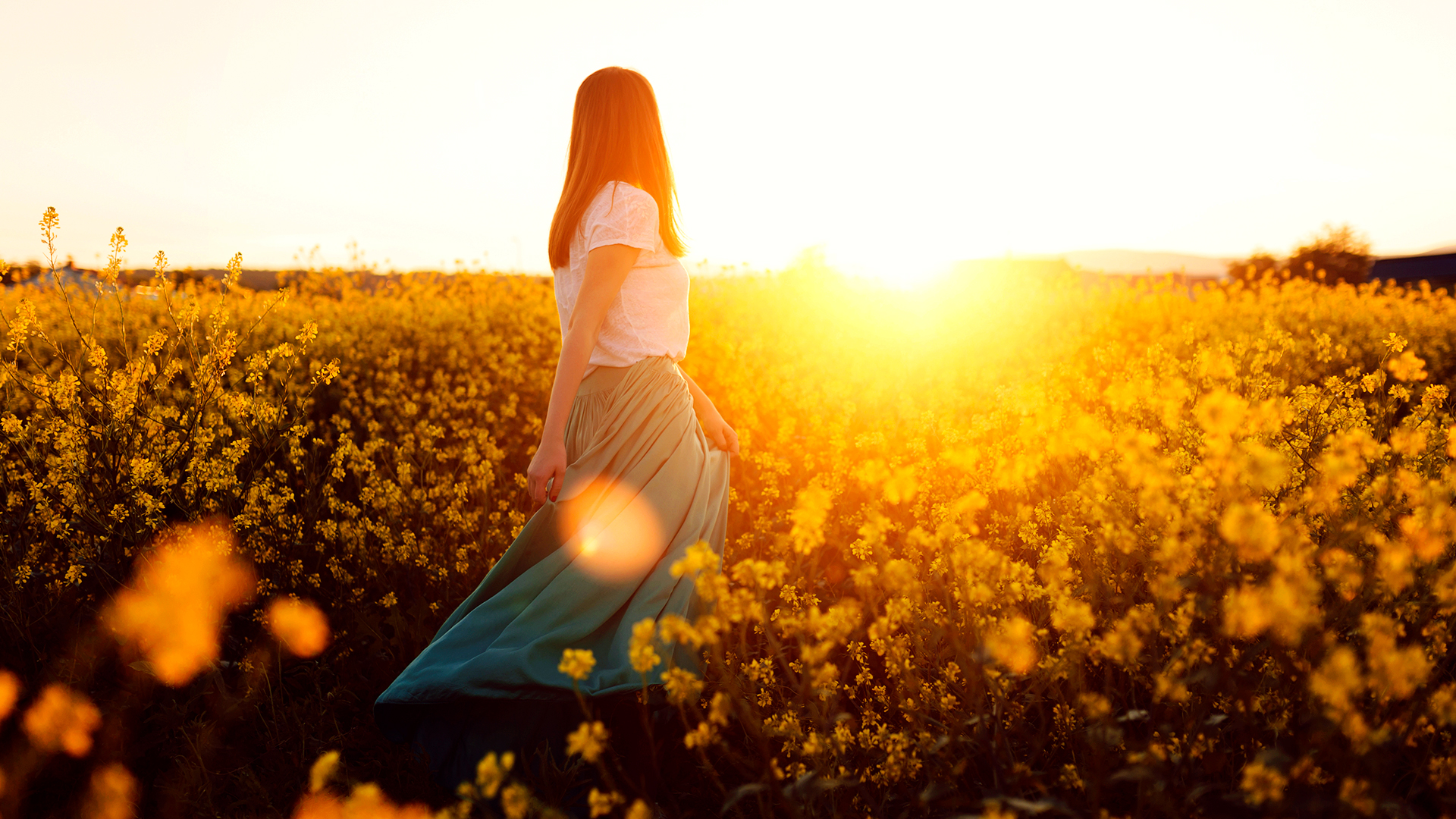lady basking in the sun in the fields